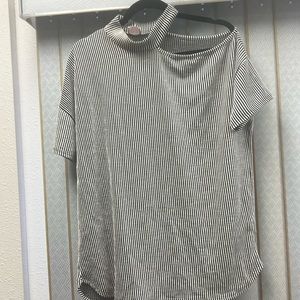 Black and white short sleeve soft material vertical stripes off the shoulder.